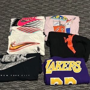 Lot of 7 nike shirts all have been worn and Fit like a Large